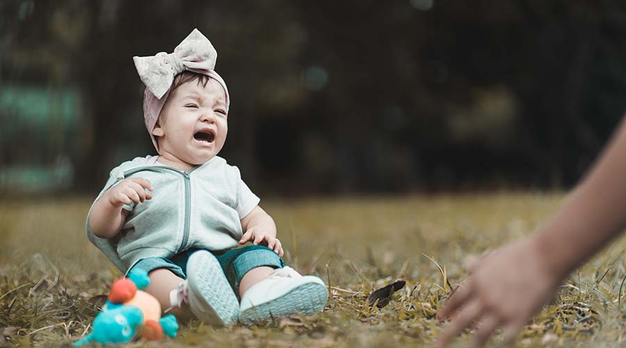 A toddler crying.