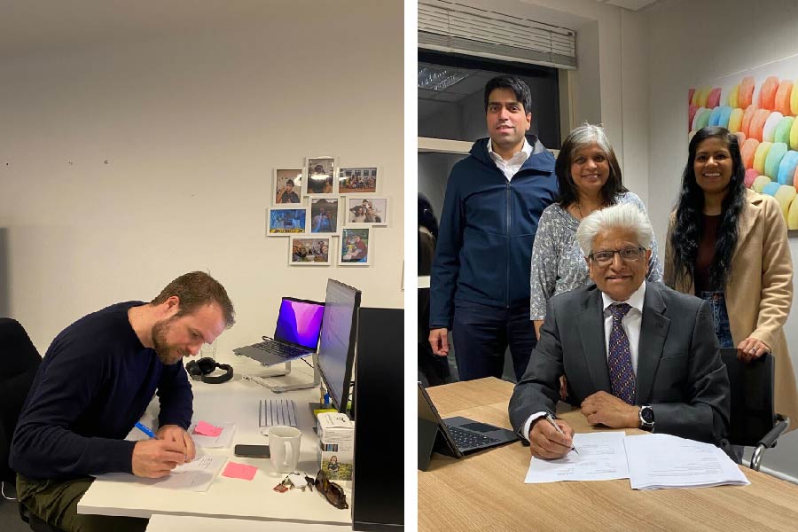 Anders Lausten (Famly) and Kirit Patel (FirstSteps) signing the deal.