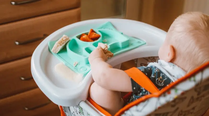Toddler having a snack
