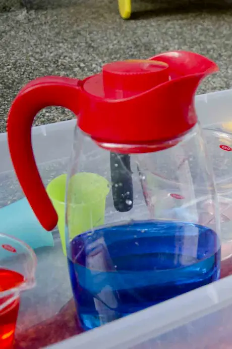 water jug filled with blue coloured water