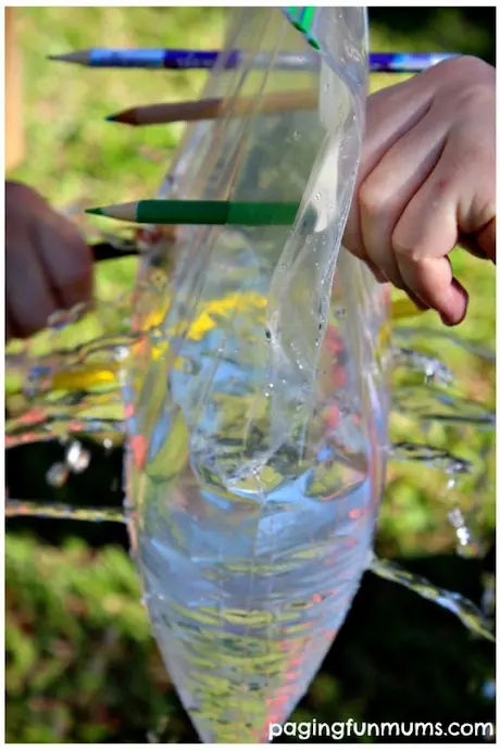pencils sticking out of water filled bags