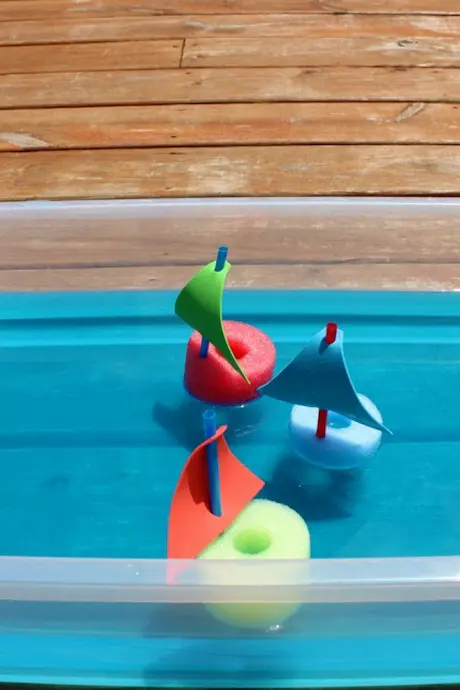 boats made of foam floating in box