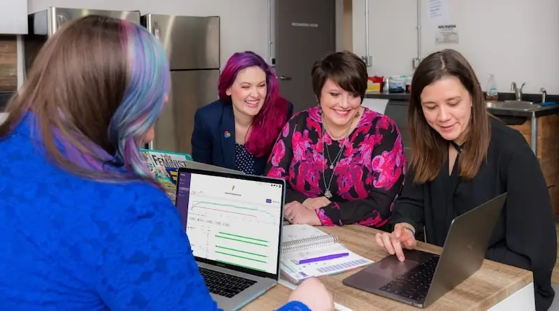 Nursery staff using computers