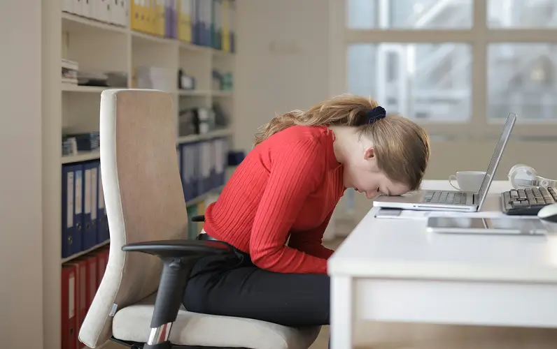 a stressed and overworked childcare staff