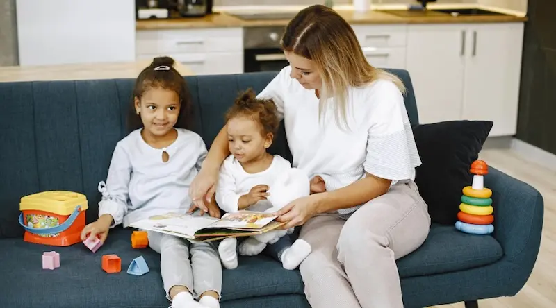 teacher and two young girls