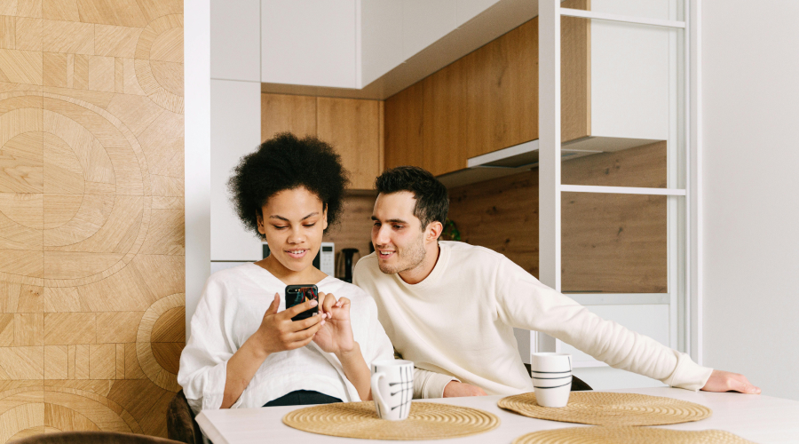a couple looking at a phone together