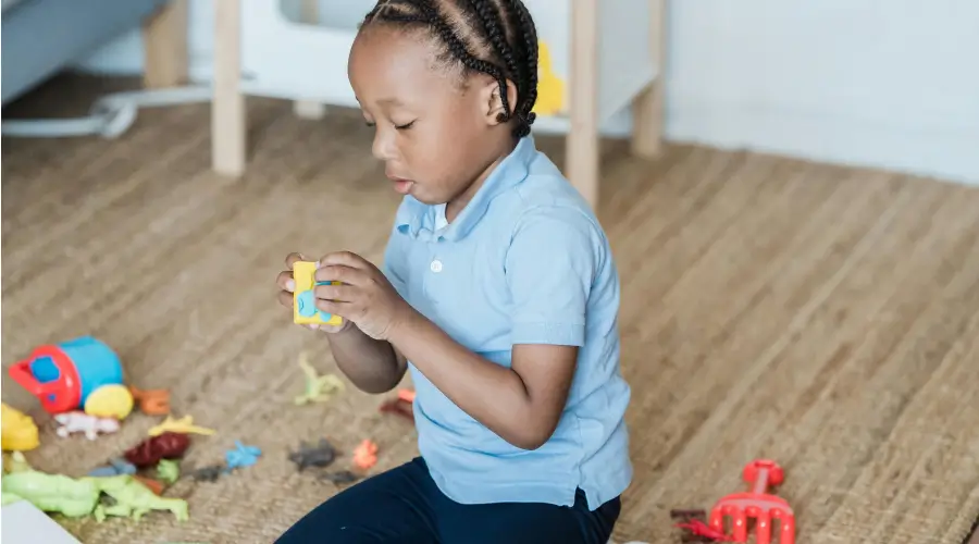 boy playing at preschool