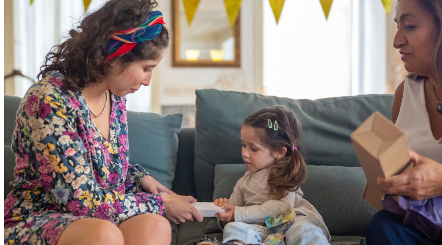 an adult teaching a young child about social emotional health