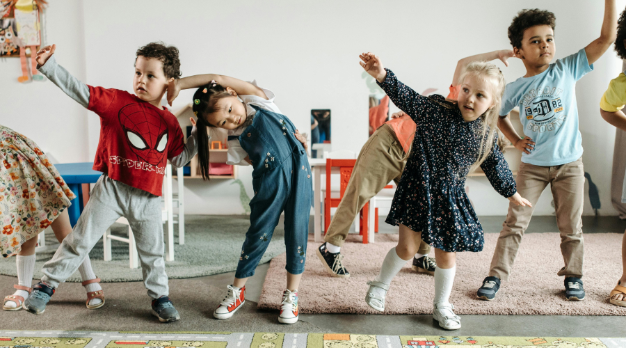 young children dancing at preschool