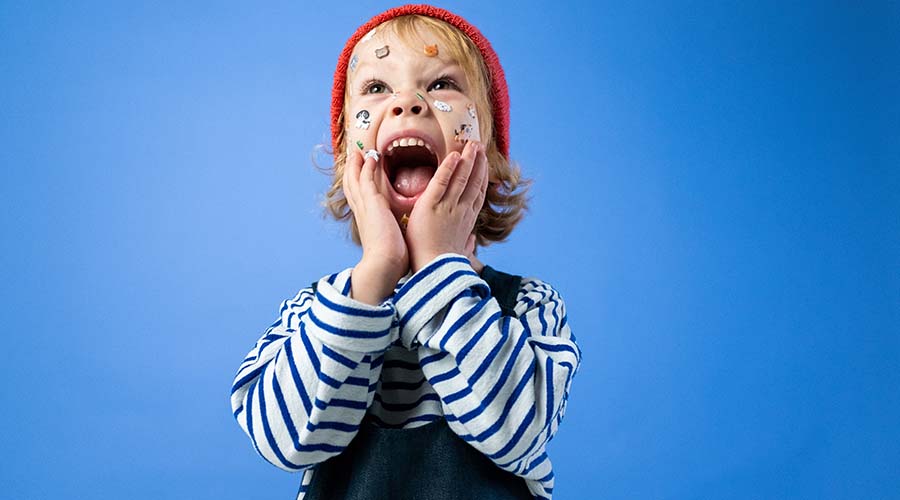 Boy expressing excitement with body language 