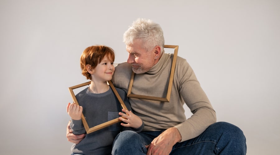 Grandfather and Grandson Having Fun with Frames