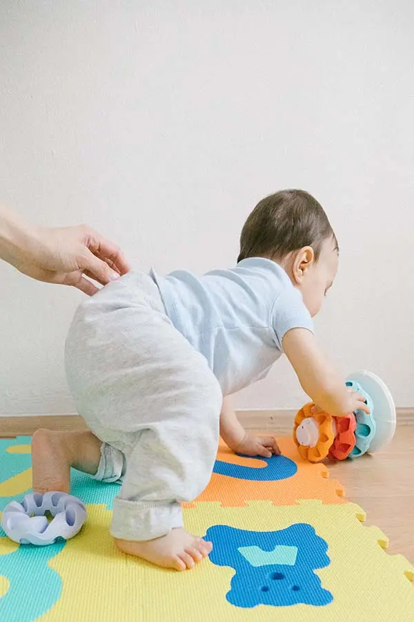 Baby Crawling on Puzzle Mat