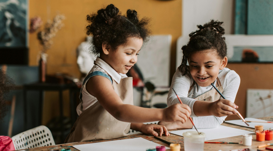 two girls painting
