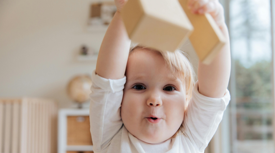 preschool boy playing with toys