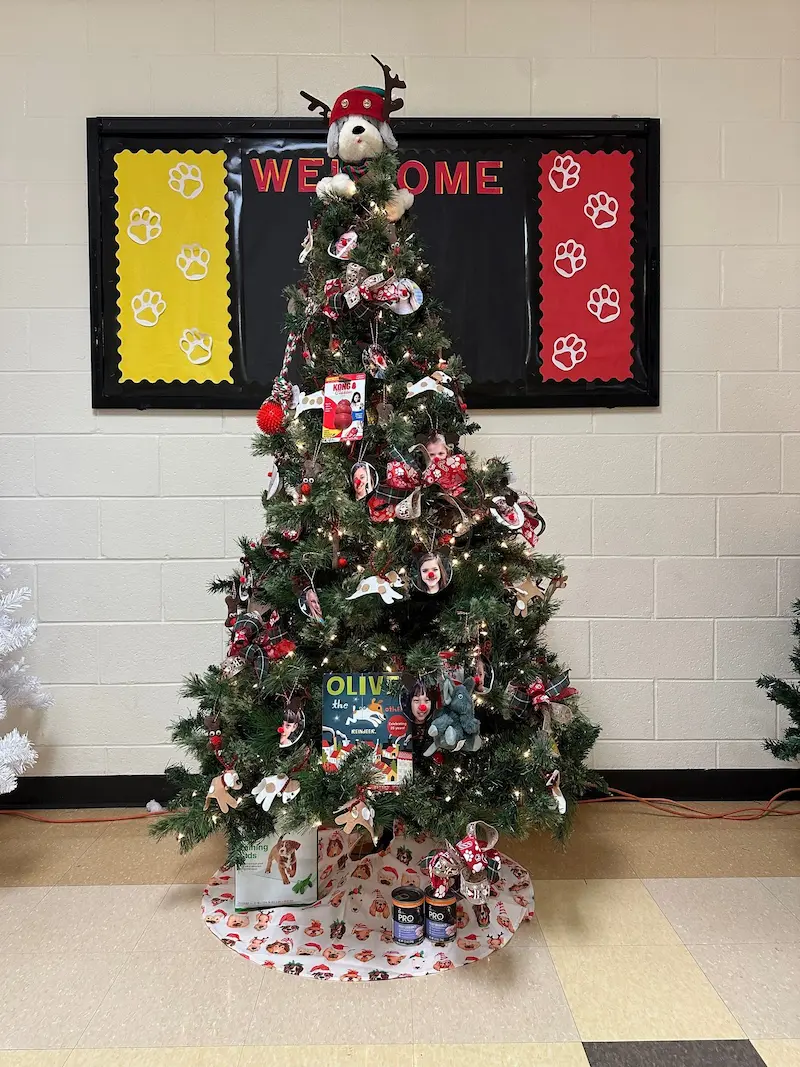 a storybook forest tree themed to Olive the Other Reindeer