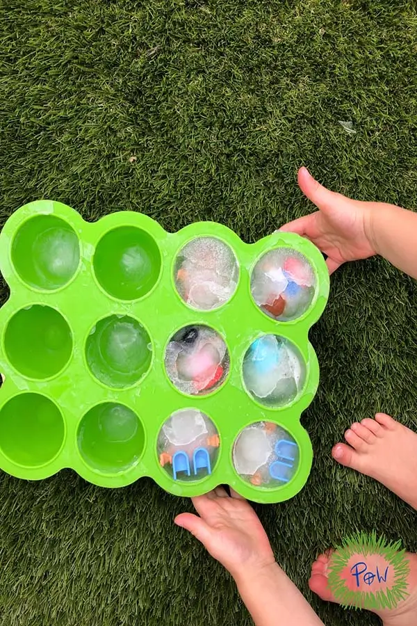 Enveloping schema play can involve freezing toys in ice