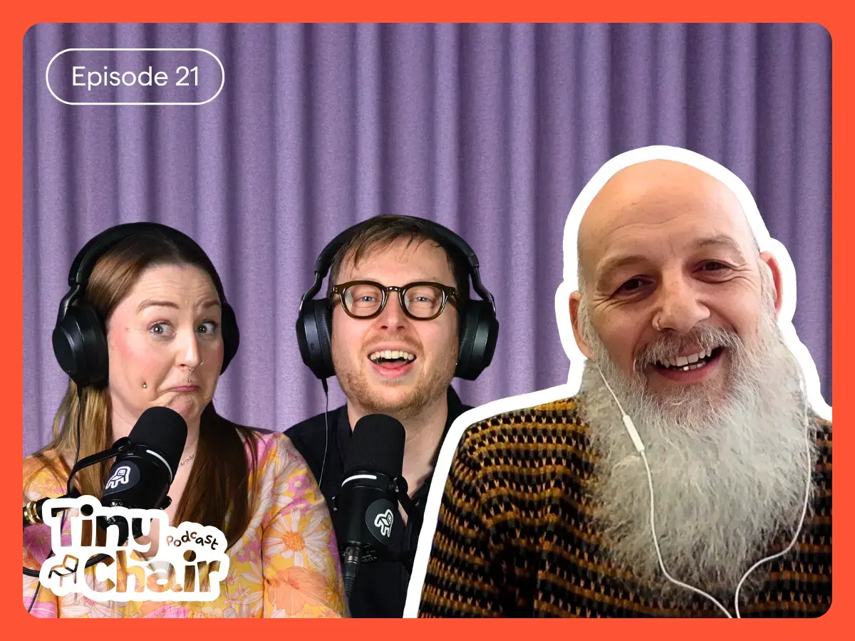 Tiny Chair Podcast hosts Julia and Matt with guest, Greg Bottrill with a purple curtain as a background