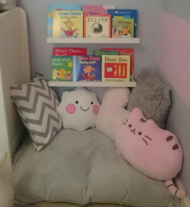 A cosy corner with books and pillows