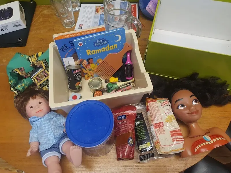 A photograph of possible inclusive resources to be used in an Early Years setting