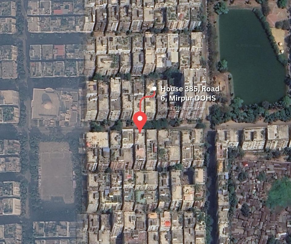 Aerial satellite view of a residential area with multi-story buildings and a large rectangular water body on the upper right, featuring a red location pin and route to House 385, Road 6, Mirpur DOHS, Dhaka 1216, Bangladesh - Acme AI's production office.