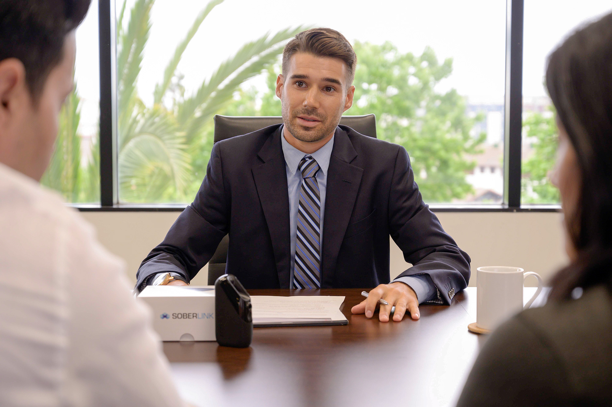 Soberlink advisor giving info about alcohol monitoring device in a child custody case