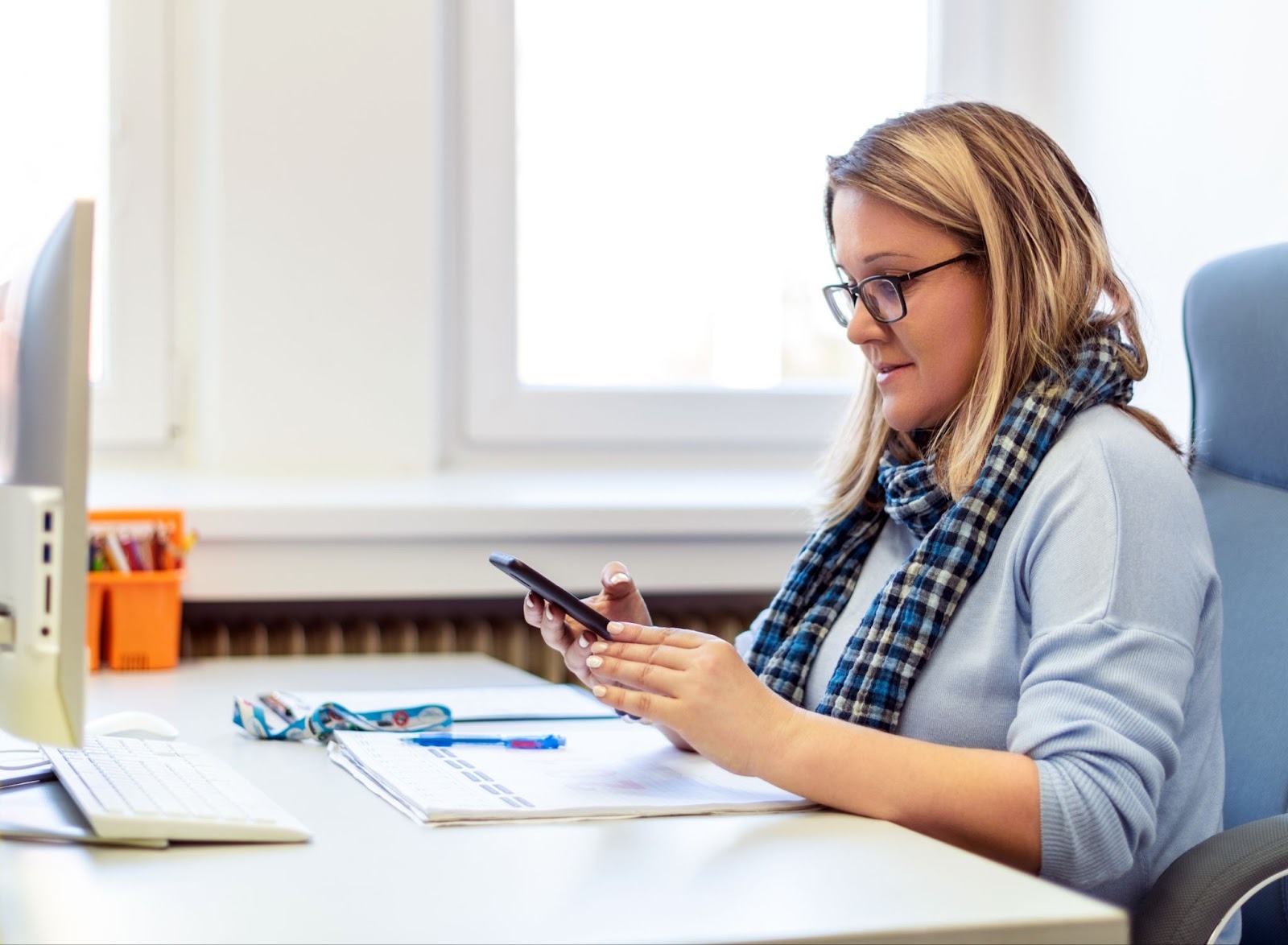 A woman checking her phone.