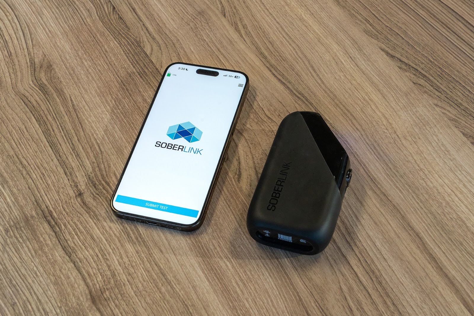 A Soberlink Device and phone.