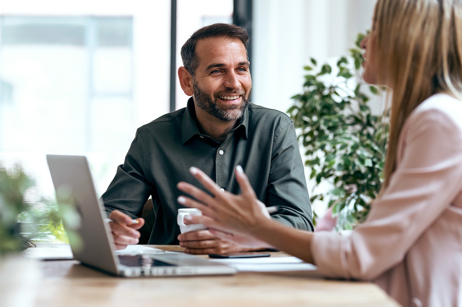 A man and woman having a conversation.