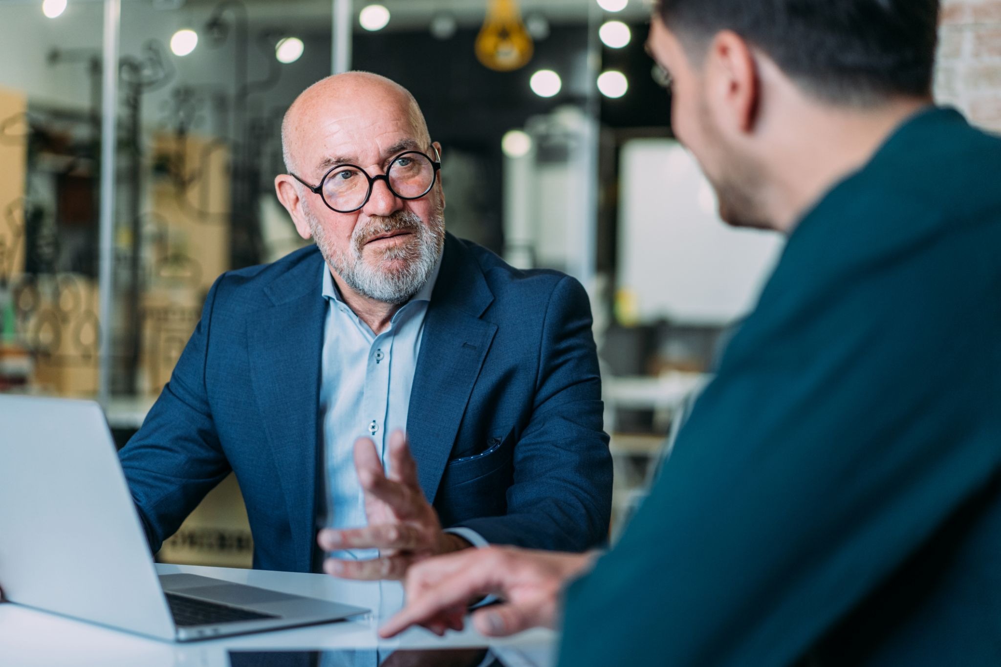 Two business men having a conversation.