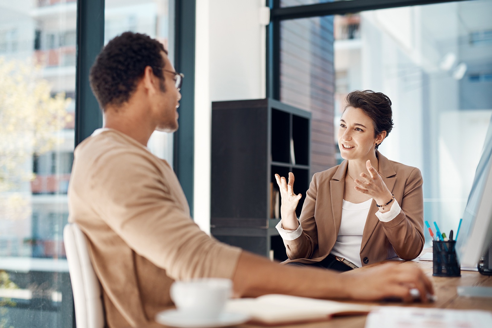 A man and woman having a conversation.