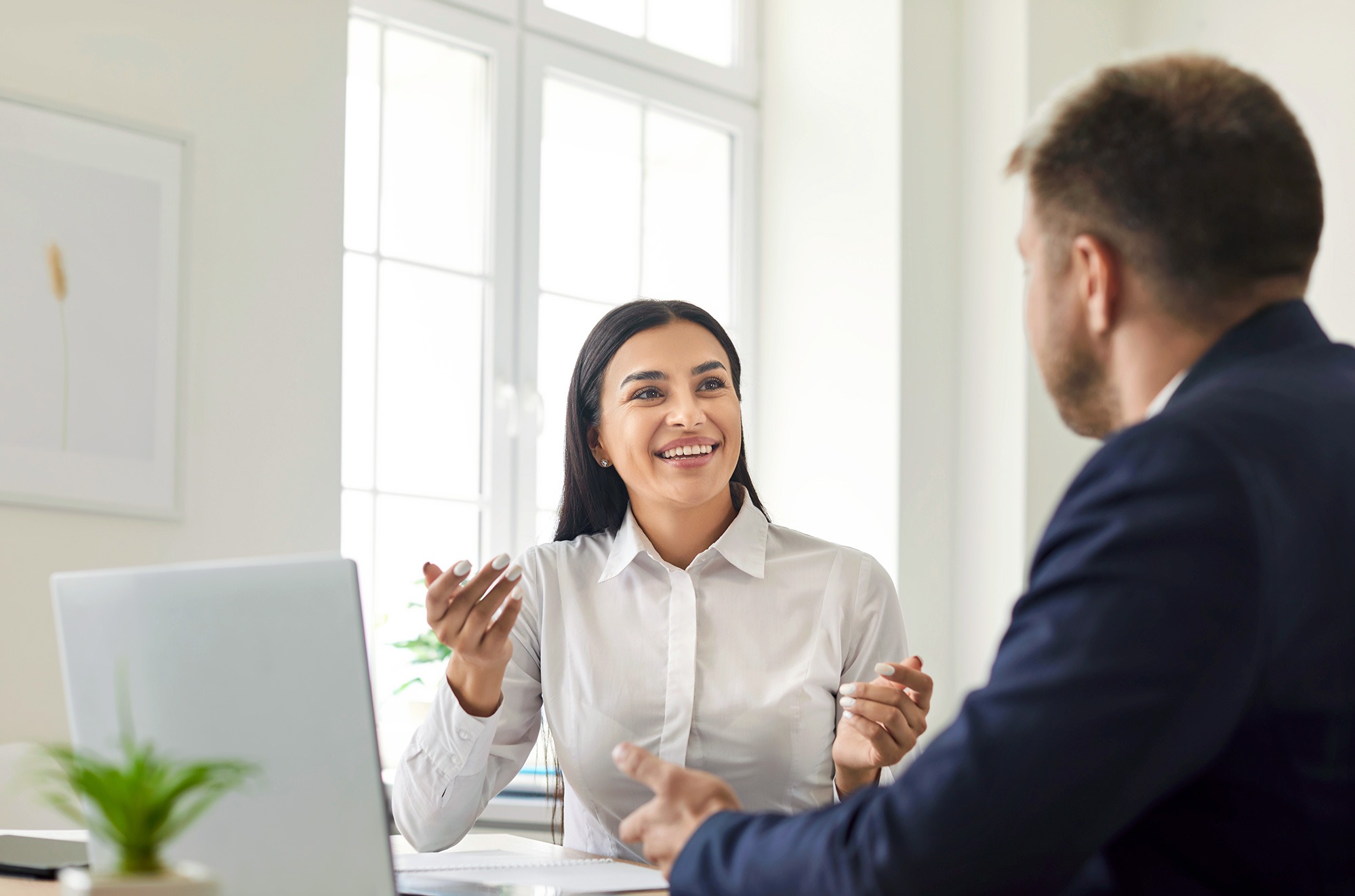 A man and woman having a meeting.