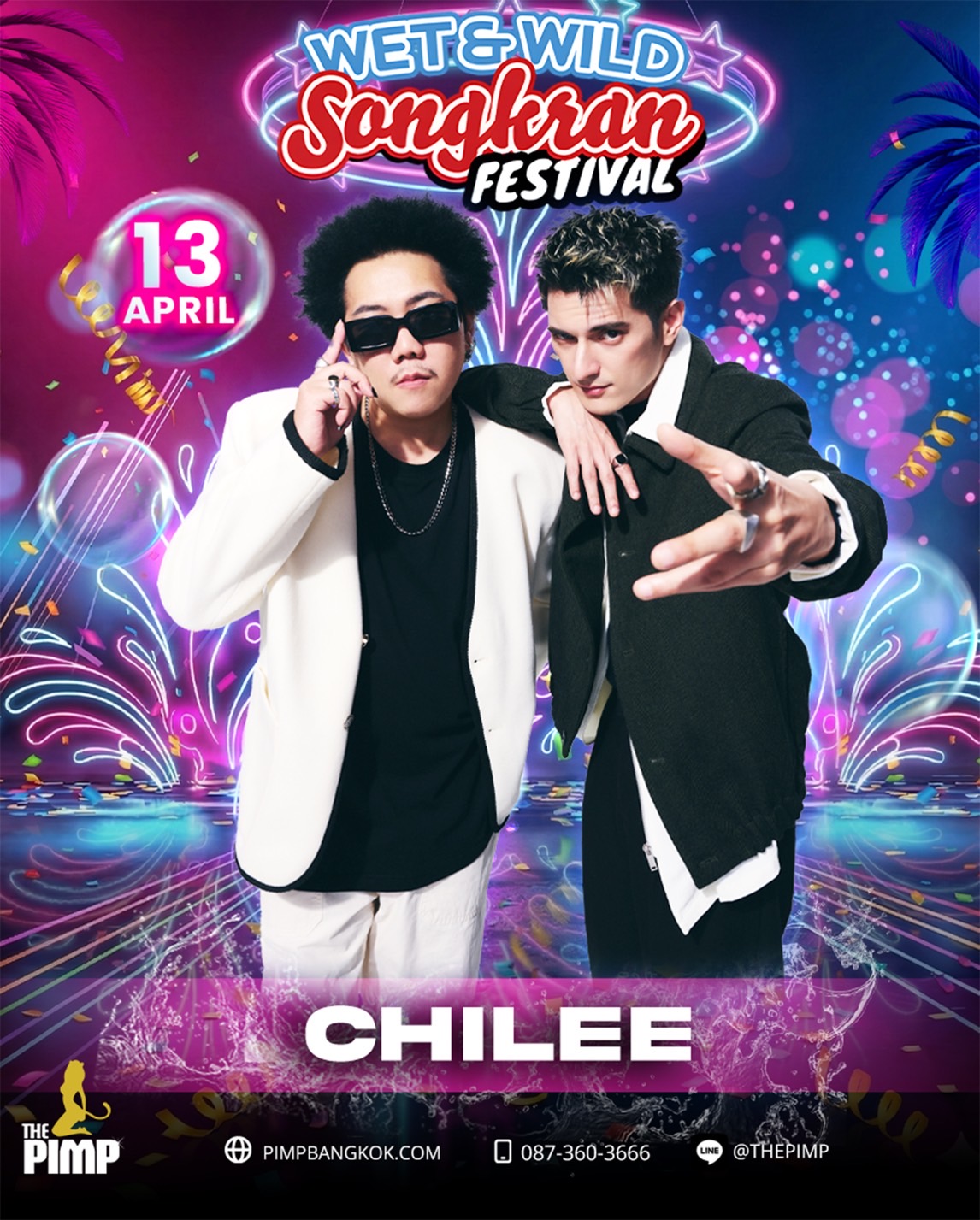 Girls on the back of a man playing in water for songkran