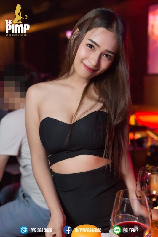 young cute Thai girl with a sexy black dress in Thailand at The PIMP Bangkok