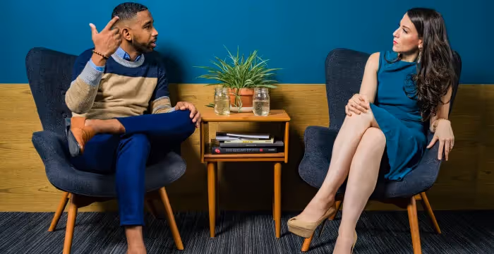 Two employees having a conversation