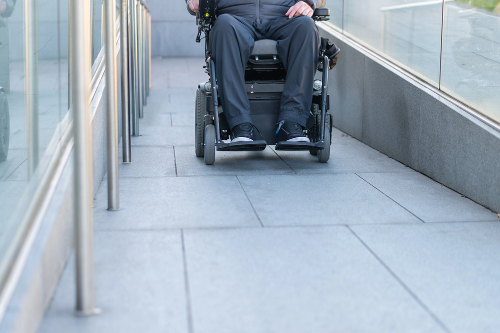 Picture of a wheel chair and legs