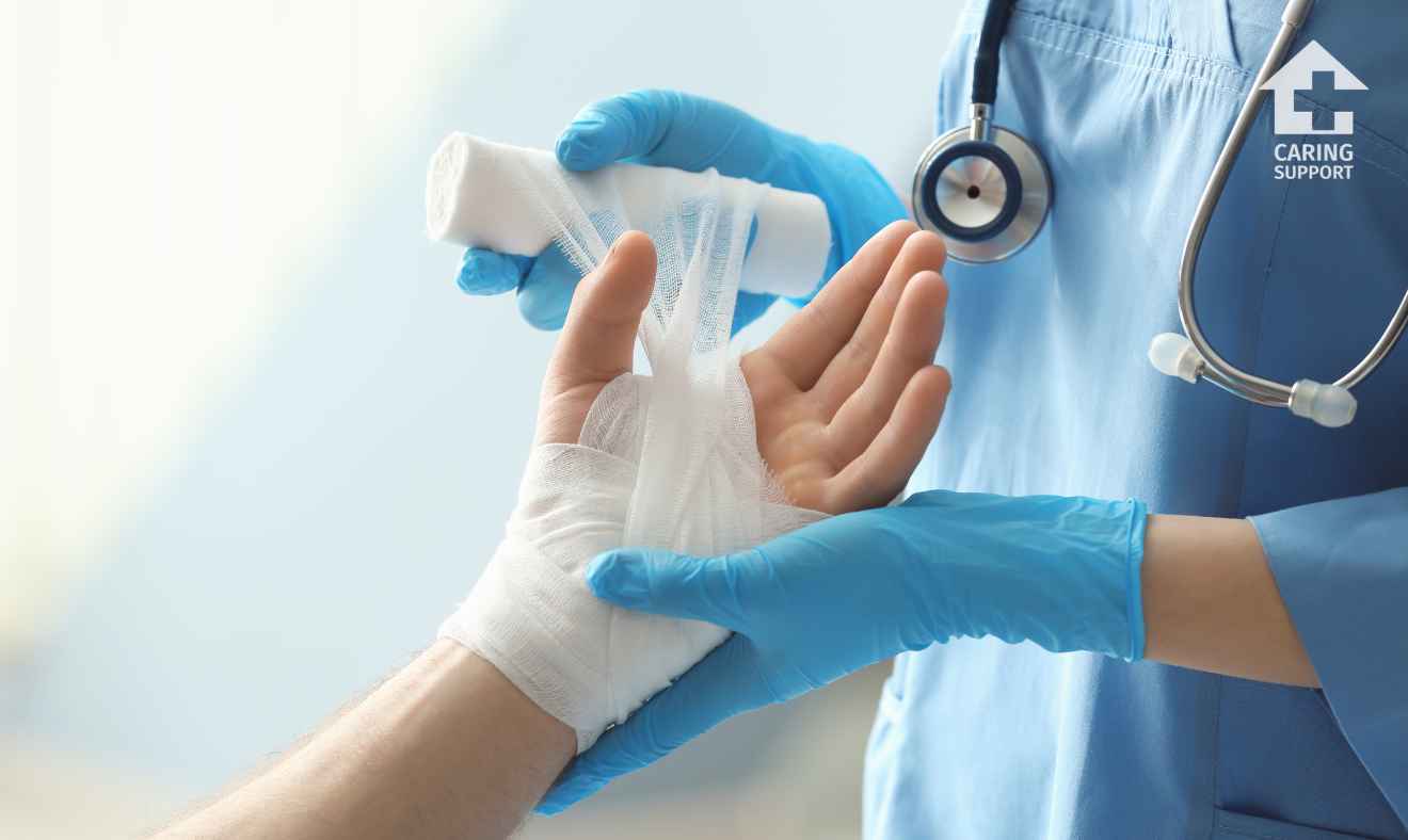 A registered nurse performing wound care to their patient.