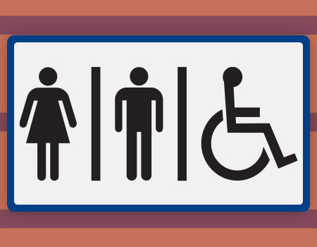 Accessible bathrooms sign on wall