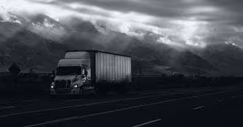 Lonely truck makes its way toward its destination