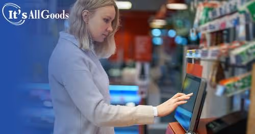 Shopper enters her order into a food service kiosk.
