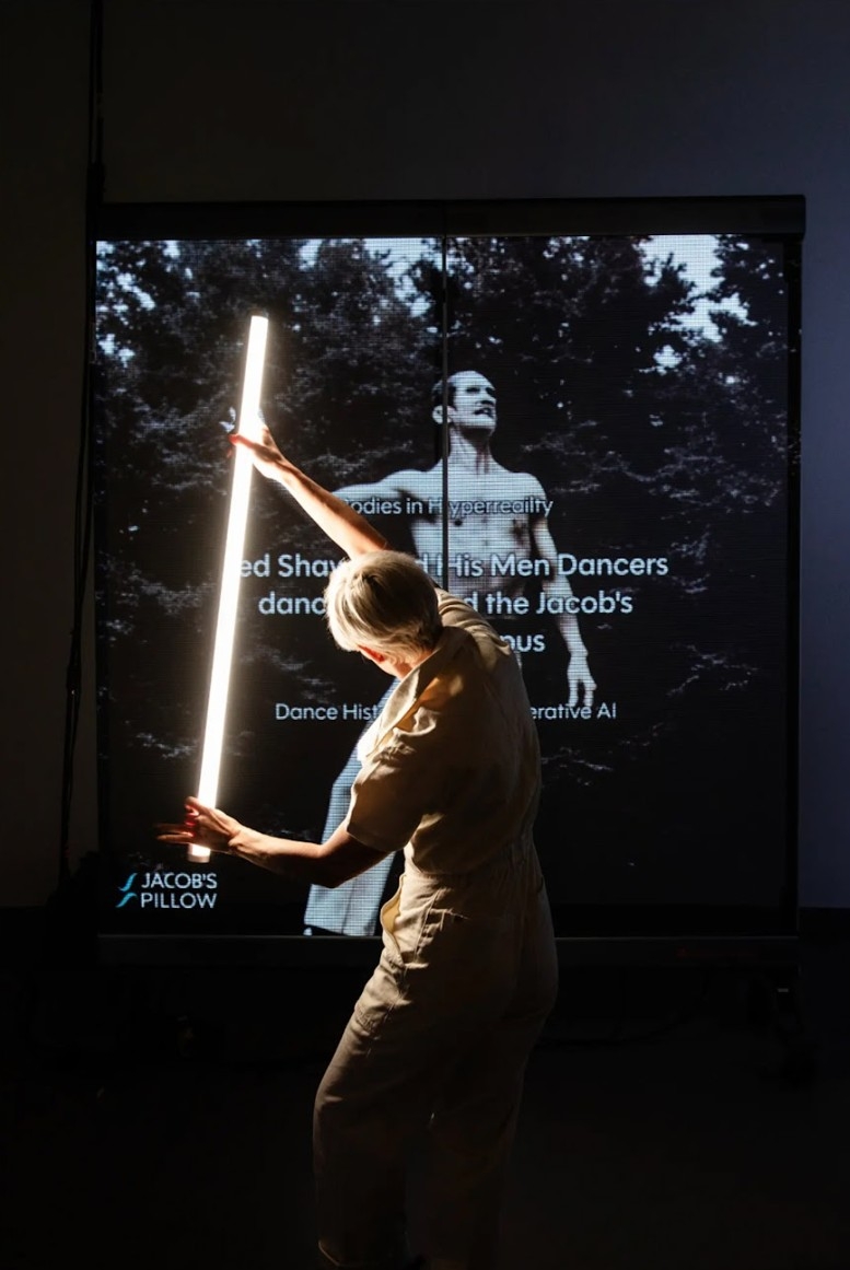 Katherine Helen Fisher interacting with "Bodies in Hyperreality" installation