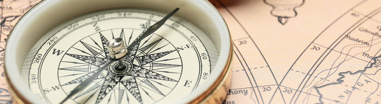 Compass and map of the world