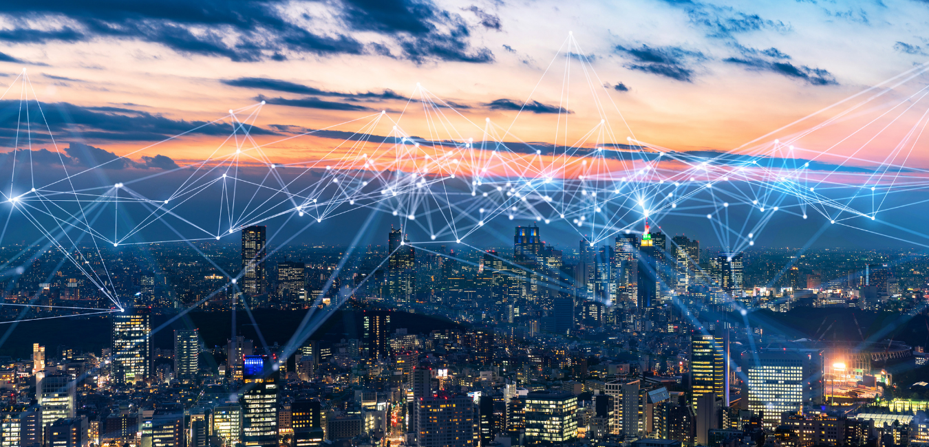 A futuristic cityscape with a network of technological energy rays connecting various buildings.