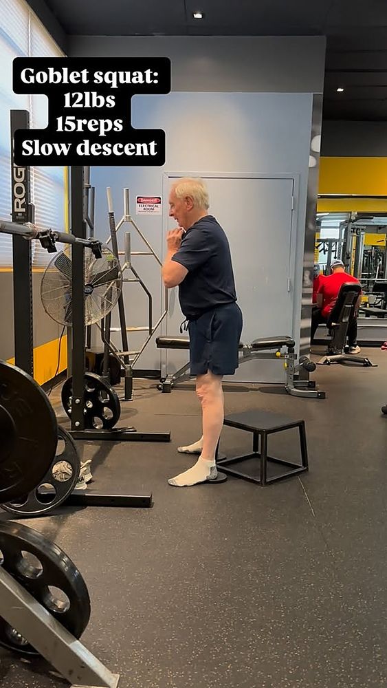 Senior personal training client performing a goblet squat at UTG in Westwood NJ
