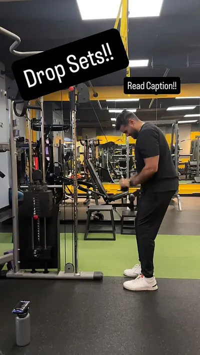 UTG personal trainer performing cable drop sets in Westwood NJ