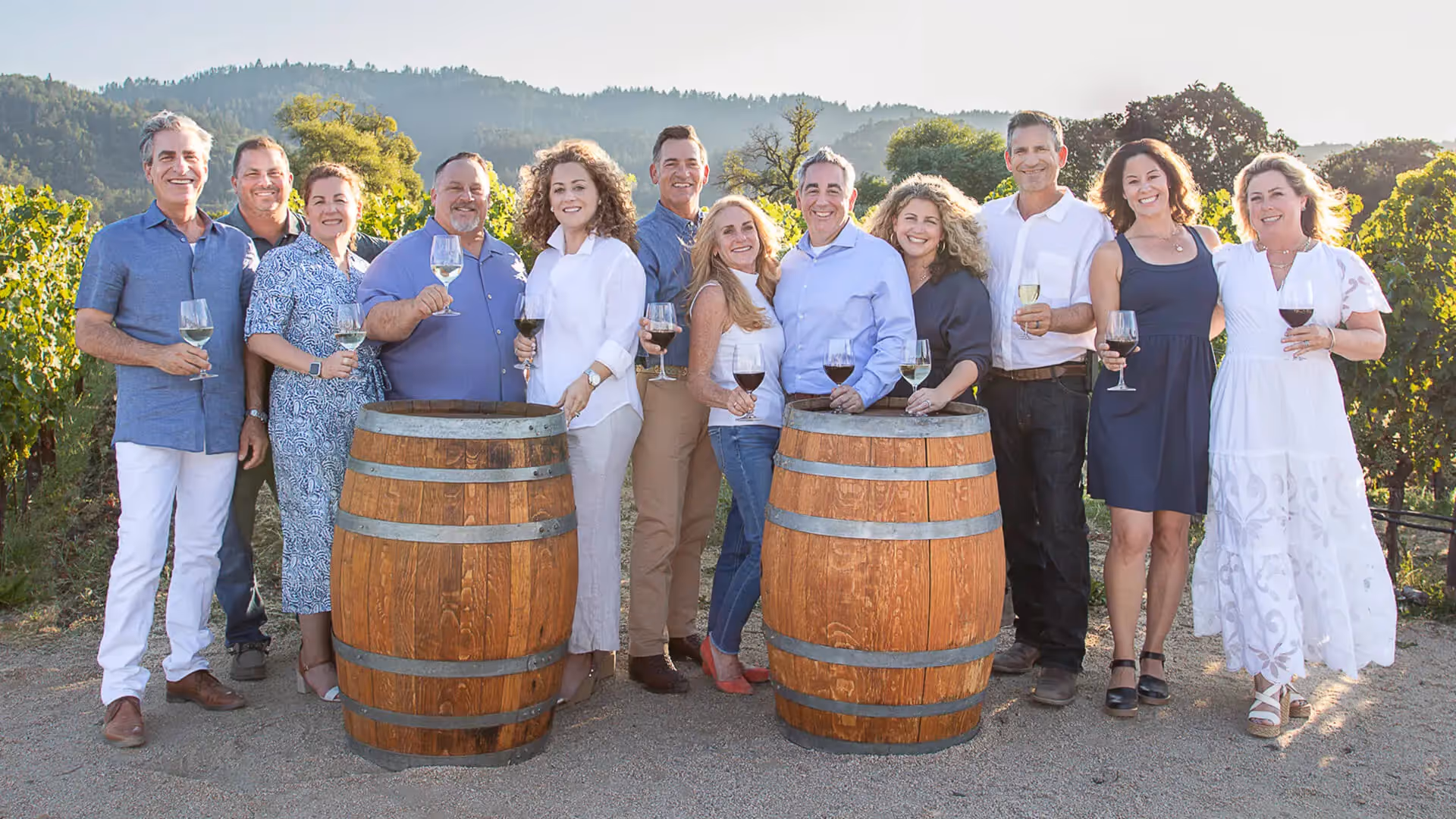 The next generation of the Franzia family lined up in a vineyard celebrating fifty years in business