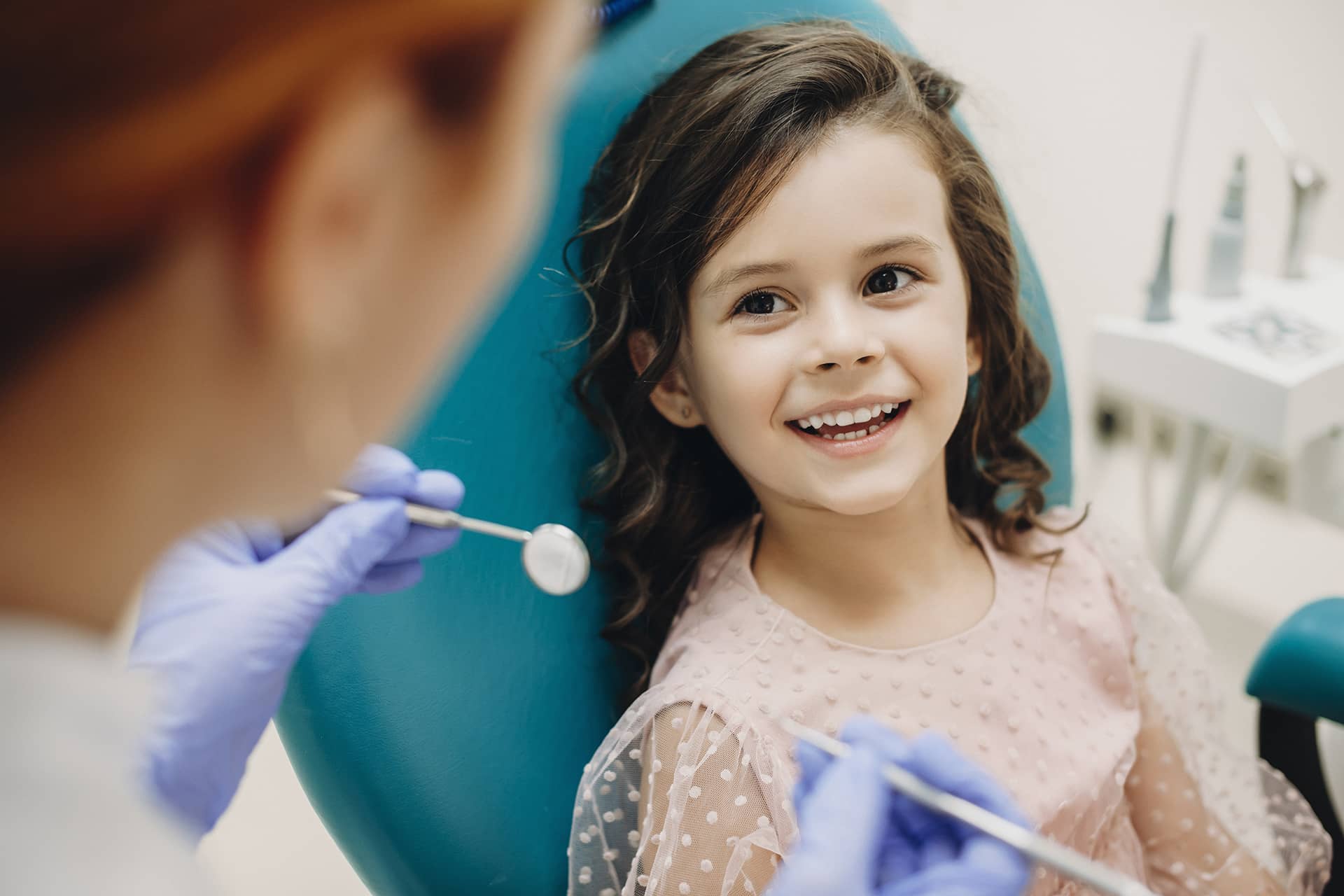 girl smiling at the dentist