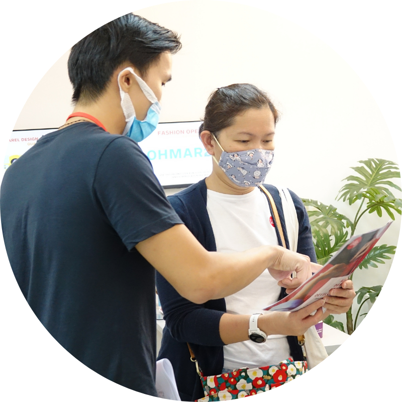 Staff assisting a student