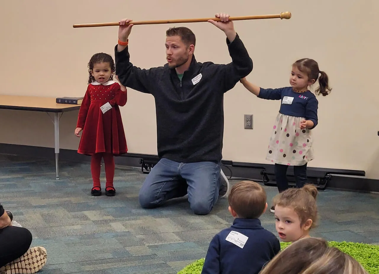 teacher with kids at First Baptist Church- Indian Trail