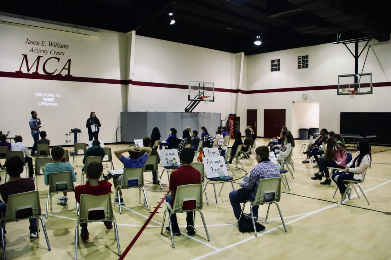 kids sitting inside activity center having lessons at First Baptist Church- Indian Trail