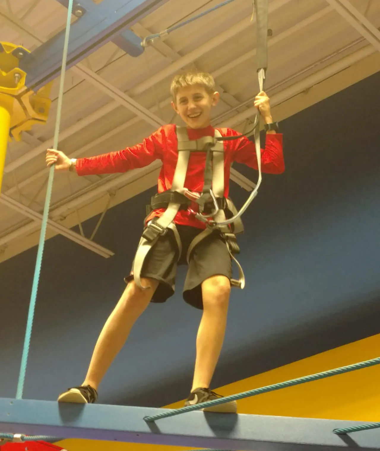 boy with red sweatshirt and harness at First Baptist Church- Indian Trail